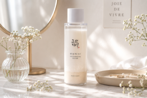 Beauty of Joseon Glow Replenishing Rice Milk Toner bottle on a marble vanity.