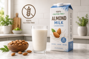 A fresh glass of gluten-free almond milk on a bright kitchen counter.